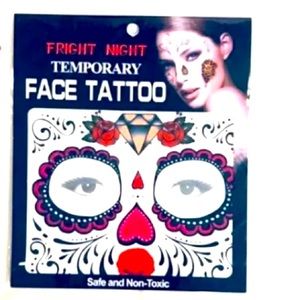 Dida de los muertos face tattoo